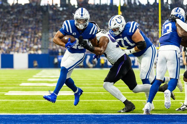 Sep 13, 2026; Indianapolis, IN, USA; Indianapolis Colts running back Jonathan Taylor (28) runs with the ball for a touchdown during NFL, American Football Herren, USA game action against the Baltimore Ravens at Lucas Oil Stadium. Mandatory Credit: -Cal Media NFL 2026: Ravens Vs Colts SEP 13  - ZUMAc04_ 20260913_zma_c04_136 Copyright: xJohnxMersitsx