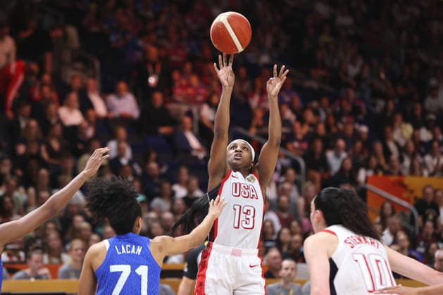 Leila Lacan, Jackie Young with the ball, Breanna Stewart in a one-on-one matchup; game action; sports; basketball; FIBA World Cup; Women s World Championship; World Cup Final; 2026–2027 season; September 13, 2026; France vs. USA