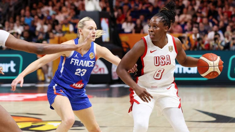 Marine Johannes, Chelsea Gray with the ball; one-on-one; game action; sports; basketball; FIBA World Cup; World Championship; Women s World Cup; Final; 2026–2027 season; September 13, 2026; France vs. USA