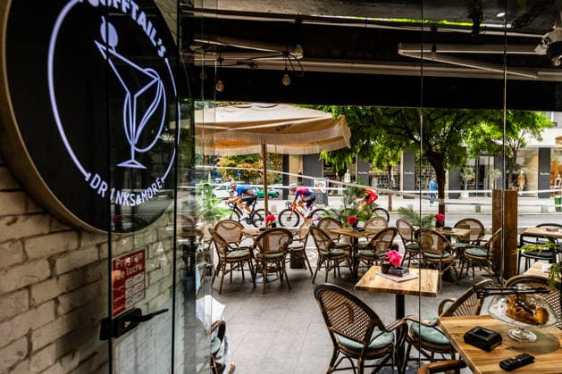 September 13, 2026, CYCLING TOUR OF ROMANIA, Stage 5 Bucharest Circuit 100 km, Bucuresti View of grup of cyclists from a coffe shop on Calea Victoriei boulevard.