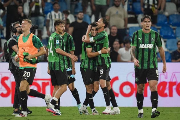 Sassuolo™s Vasilije Adzic celebrates with Sassuolo™s head coach Roberto Aquilani after scoring the 3-2 goal for his team during the Serie A soccer match between Sassuolo and Juventus at the Mapei Stadium in Reggio Emilia, north Italy - Sunday, September 13, 2026 -  Copyright: xMassimoxPaolone LaPressex