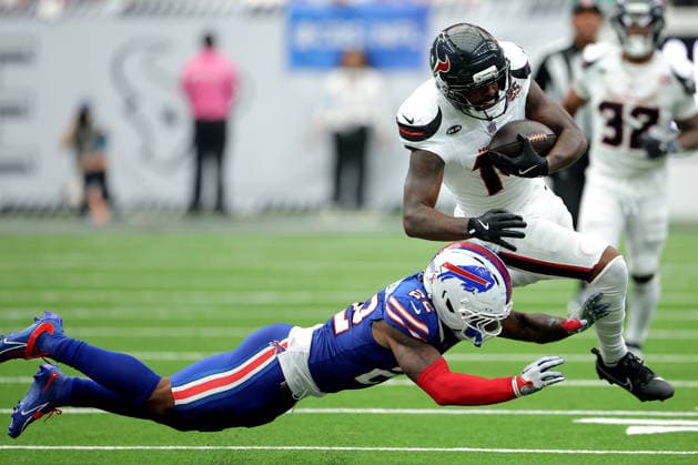 September 13, 2026, Houston, Texas, U.S: Houston Texans wide receiver Kayshon Boutte (14) is tackled by Buffalo Bills safety C.J. Gardner-Johnson (22) after catching a pass during the third quarter of the NFL, American Football Herren, USA regular season game between the Houston Texans and the Buffalo Bills at Reliant Stadium in Houston, TX on September 13, 2026. NFL 2026 - Buffalo Bills Vs Houston Texans  - ZUMAw137 20260913_aap_w137_052 Copyright: xErikxWilliamsx