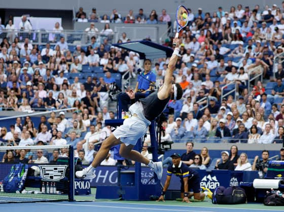 Ben Shelton jumps to return the ball to Alexander Zverev of Germany in the third set of the Men s Finals match in Arthur Ashe Stadium at the 2026 US Open Tennis Championship at the USTA Billie Jean King National Tennis Center in New York City on Sunday, September 13, 2026.  NYP20260913844 COREYxSIPKIN