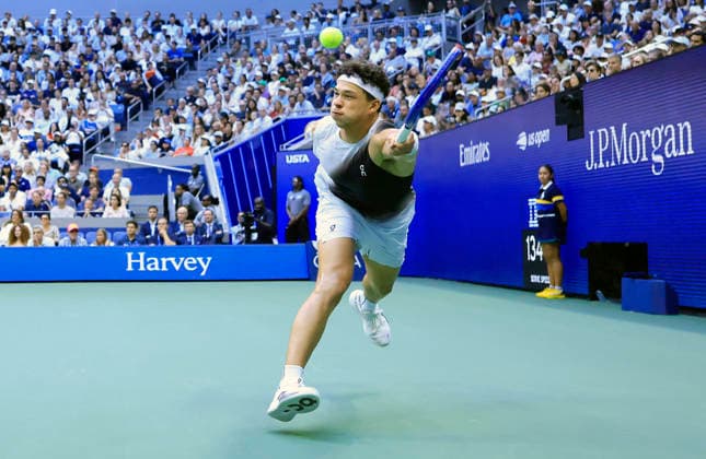 Ben Shelton reaches to return the ball to Alexander Zverev of Germany in the third set of the Men s Finals match in Arthur Ashe Stadium at the 2026 US Open Tennis Championship at the USTA Billie Jean King National Tennis Center in New York City on Sunday, September 13, 2026.  NYP20260913842 COREYxSIPKIN