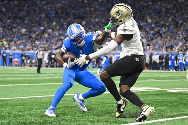 Sep 13, 2026; Detroit, MI, USA; New Orleans Saints cornerback Kool-Aid McKinstry (1) gets stiff-armed as Detroit Lions running back Jahmyr Gibbs (0) makes a move at Ford Field. Mandatory Credit: -Cal Media NFL, American Football Herren, USA 2026: Saints Vs Lions SEP 13  - ZUMAc04_ 20260913_zma_c04_265 Copyright: xAllanxDranbergx