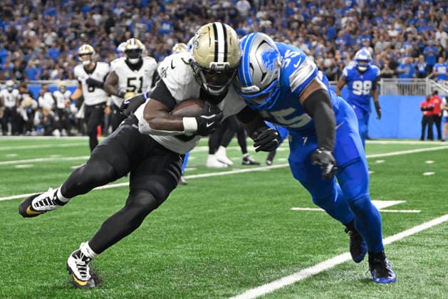 Sep 13, 2026; Detroit, MI, USA; New Orleans Saints running back Travis Etienne Jr. (3) collides with Detroit Lions linebacker Derrick Barnes (55) at Ford Field. Mandatory Credit: -Cal Media NFL, American Football Herren, USA 2026: Saints Vs Lions SEP 13  - ZUMAc04_ 20260913_zma_c04_280 Copyright: xAllanxDranbergx