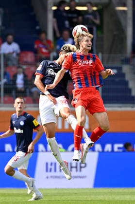 Heading duel, tackle, action: Hiroki Sekine (Holstein Kiel 32) vs. Jan Schoeppner (1 FC Heidenheim 1846 FCH 03), 1 FC Heidenheim 1846 FCH vs. Holstein Kiel KSV, September 13, 2026, DFL REGREGULATIONS PROHIBIT ANY USE OF PHOTOGRAPHS AS IMAGE SEQUENCES AND OR QUASI-VIDEO 1 FC Heidenheim 1846 FCH vs. Holstein Kiel KSV