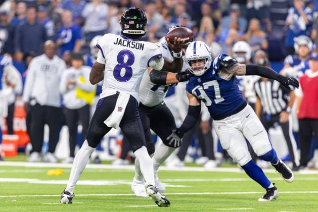 September 13, 2026, Indianapolis, Indiana, U.S: Baltimore Ravens quarterback Lamar Jackson (8) passes under pressure from Indianapolis Colts defensive lineman Laiatu Latu (97) during the game between the Baltimore Ravens and the Indianapolis Colts at Lucas Oil Stadium, Indianapolis, Indiana. NFL, American Football Herren, USA 2026 Ravens 41-23 Colts  - ZUMAs304 20260913_zaf_s304_065 Copyright: xScottxStuartx