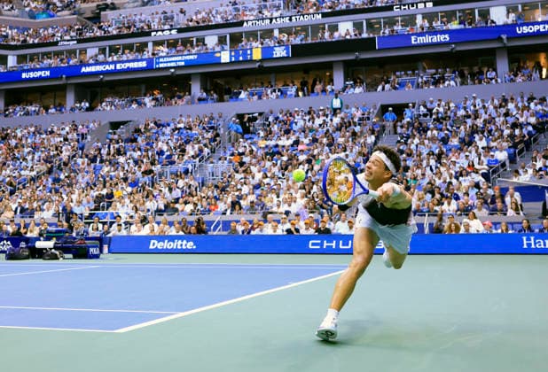 Ben Shelton reaches to return the ball to Alexander Zverev of Germany in the fourth set of the Men s Finals match in Arthur Ashe Stadium at the 2026 US Open Tennis Championship at the USTA Billie Jean King National Tennis Center in New York City on Sunday, September 13, 2026.  NYP20260913852 COREYxSIPKIN