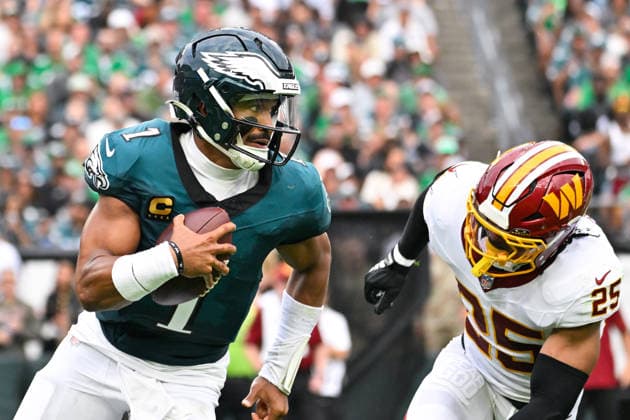 September 13, 2026; Philadelphia, Pennsylvania, USA; Philadelphia Eagles quarterback Jalen Hurts (1) runs the ball against Washington Commanders safety Nick Cross (25) during the first half at Lincoln Financial Field. Mandatory Credit: -Cal Media NFL, American Football Herren, USA 2026: Commanders Vs Eagles SEP 13  - ZUMAc04_ 20260913_zma_c04_313 Copyright: xEricxCanhax