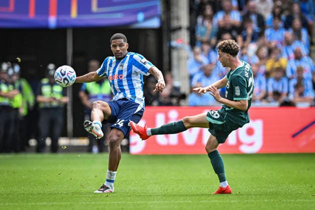 13th September 2026; Coventry Building Society Arena, Coventry, West Midlands, England; Premier League Football, Coventry City versus Brighton and Hove Albion; Aurele Amenda of Coventry City clers the ball past Maxim De Cuyper of Brighton and Hove Albion GodfreyxPitt