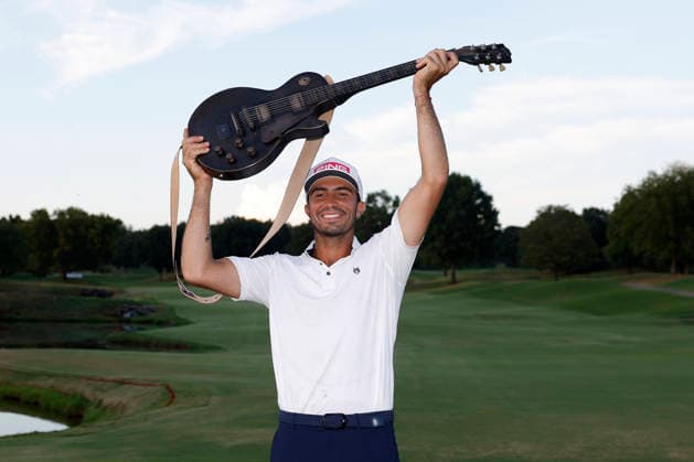 FRANKLIN, TN - SEPTEMBER 13: Alvaro Ortiz of Mexico poses lifts the championship trophy guitar over his head after winning the Simmons Bank Open for the Snedeker Foundation, September 13, 2026 at Vanderbilt Legends Club in Franklin, Tennessee. (Photo by Matthew Maxey Icon Sportswire) GOLF: SEP 13 Korn Ferry Tour Simmons Bank Open EDITORIAL USE ONLY Icon260913040