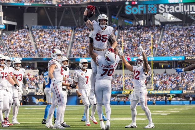 INGLEWOOD, CA - SEPTEMBER 13: Trey McBride 85 celebrates his touchdown with Paris Johnson Jr. 70 of the Arizona Cardinals during an NFL, American Football Herren, USA game between the Arizona Cardinals and the Los Angeles Chargers on September 13, 2026, at SoFi Stadium in Inglewood, California. (Photo by Greg Fiore Icon Sportswire) NFL: SEP 13 Cardinals at Chargers EDITORIAL USE ONLY Icon2609132031
