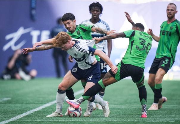 September 13, 2026, Vancouver, Bc, CANADA: Vancouver Whitecaps Oliver Larraz (8) is grabbed by Austin FC s Joseph Rosales (30) and Ervin Torres (38) as they vie for the ball during the first half of an MLS, Fussball Herren, USA soccer match, in Vancouver, on Sunday, Sept. 13, 2026. Canada News - September 13, 2026  - ZUMAc35_ 20260913_zaf_c35_127 Copyright: xDarrylxDyckx