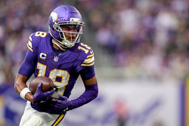 MINNEAPOLIS, MN - SEPTEMBER 13: Minnesota Vikings wide receiver Justin Jefferson (18) runs with the ball during the fourth quarter of a NFL, American Football Herren, USA game between the Minnesota Vikings and Green Bay Packers on September 13, 2026, at U.S. Bank Stadium in Minneapolis MN. (Photo by Nick Wosika Icon Sportswire) NFL: SEP 13 Packers at Vikings EDITORIAL USE ONLY Icon20260913021