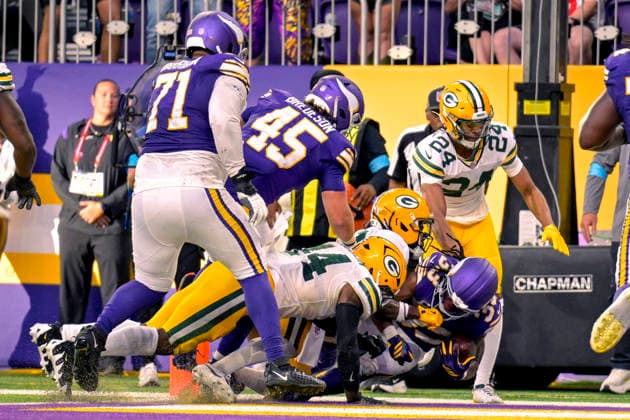 MINNEAPOLIS, MN - SEPTEMBER 13: Minnesota Vikings running back Aaron Jones (33) scores a touchdown on a 3-yard run during the fourth quarter of a NFL, American Football Herren, USA game between the Minnesota Vikings and Green Bay Packers on September 13, 2026, at U.S. Bank Stadium in Minneapolis MN. (Photo by Nick Wosika Icon Sportswire) NFL: SEP 13 Packers at Vikings EDITORIAL USE ONLY Icon20260913031