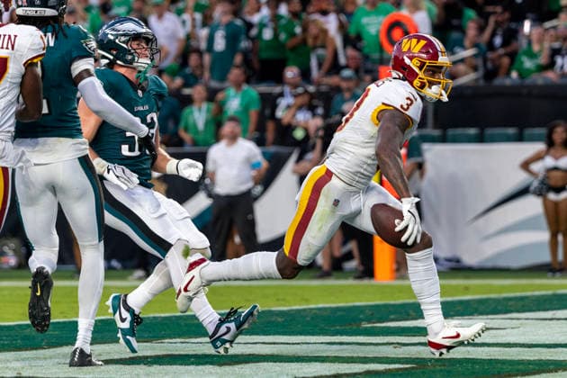 Washington Commanders wide receiver Stefon Diggs (3) runs into the end zone for a touchdown past Philadelphia Eagles cornerback Cooper DeJean (33) in the fourth quarter of NFL, American Football Herren, USA action at Lincoln Financial Field in Philadelphia, Pennsylvania on Sunday, September 13, 2026.  PHI20260913014 LAURENCExKESTERSON