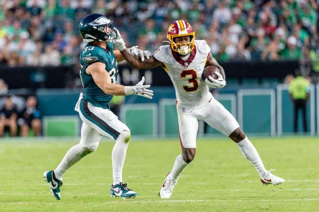 Washington Commanders wide receiver Stefon Diggs (3) pushes away from Philadelphia Eagles cornerback Cooper DeJean (33) at the twenty-nine yard line for a first down in the fourth quarter of NFL, American Football Herren, USA action at Lincoln Financial Field in Philadelphia, Pennsylvania on Sunday, September 13, 2026.  PHI20260913020 LAURENCExKESTERSON