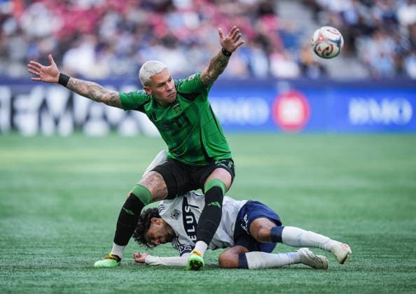 September 13, 2026, Vancouver, Bc, CANADA: Austin FC s Christian Ramirez, front, and Vancouver Whitecaps Jeevan Badwal collide during the second half of an MLS, Fussball Herren, USA soccer match, in Vancouver, on Sunday, Sept. 13, 2026. Canada News - September 13, 2026  - ZUMAc35_ 20260913_zaf_c35_168 Copyright: xDarrylxDyckx