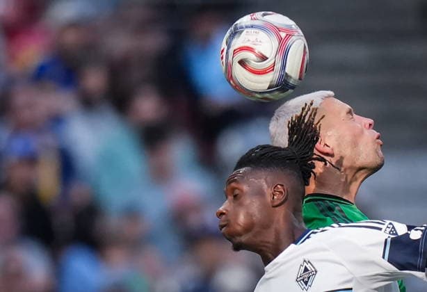 September 13, 2026, Vancouver, Bc, CANADA: Vancouver Whitecaps Cheikh Sabaly, front left, and Austin FC s Christian Ramirez vie for the ball during the second half of an MLS, Fussball Herren, USA soccer match, in Vancouver, on Sunday, Sept. 13, 2026. Canada News - September 13, 2026  - ZUMAc35_ 20260913_zaf_c35_191 Copyright: xDarrylxDyckx
