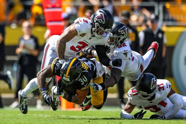 September 13, 2026, Pittsburgh, Pennsylvania, USA: Pittsburgh Steelers running back JAYLEN WARREN (30) is brought down by Atlanta Falcons safeties JESSIE BATES III (3) and XAVIER WATTS (31) during the NFL, American Football Herren, USA football game between the Pittsburgh Steelers and the Atlanta Falcons in Pittsburgh, Pennsylvania. NFL 2026: Falcons 13: 20 Steelers  - ZUMAg257 20260913_zsp_g257_105 Copyright: xBrentxGudenschwagerx
