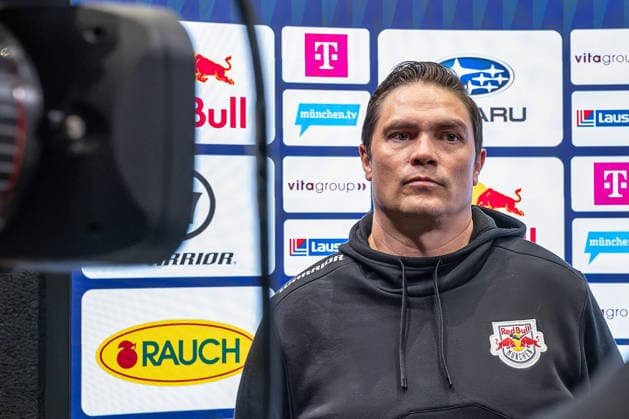 Neville Rautert, Managing Director of Sports for EHC Red Bull Munich, during an interview in front of the sponsor wall. GER, EHC Red Bull Munich, ice hockey, DEL, Open Locker Room, September 14, 2026. Photo by HMB Media, Heike Feiner Copyright: HMBxMedia HeikexFeiner