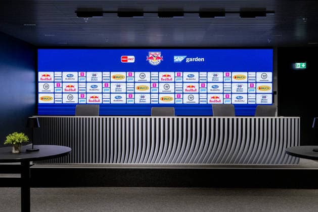 The stage in front of the sponsor wall in the GER press conference room, EHC Red Bull Munich, ice hockey, DEL, Open Locker Room, September 14, 2026. Photo: HMB Media, Heike Feiner Copyright: HMBxMedia HeikexFeiner