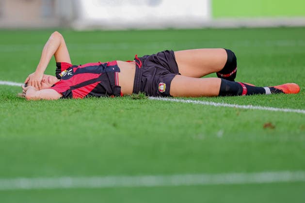 September 14, 2026, Soccer, Women s Bundesliga 1, Bayer 04 Leverkusen vs. FC Bayern Munich, Matchday 4, Ulrich Haberland Stadium, 2026–27 Season Selina Ostermeier of Bayer 04 Leverkusen 02 is injured on the field and requires medical attention; she is injured due to dizziness; injury on the field. DFB regulations prohibit any use of photographs as image sequences and or quasi-video. North Rhine-Westphalia, Germany