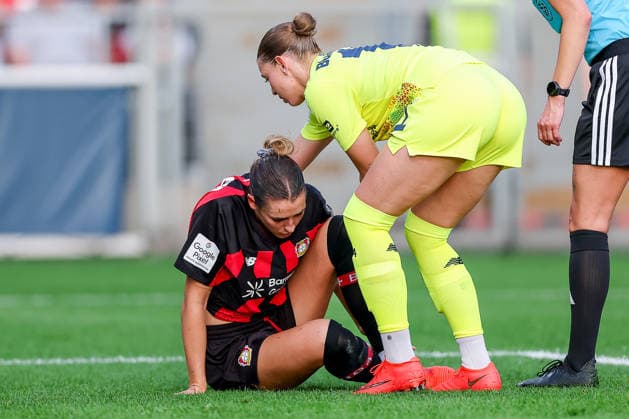September 14, 2026, Soccer, Women s Bundesliga 1, Bayer 04 Leverkusen vs. FC Bayern Munich, Matchday 4, Ulrich Haberland Stadium, 2026–27 Season Selina Ostermeier of Bayer 04 Leverkusen 02 is injured on the field and requires medical attention; she is injured due to dizziness; injury on the field. DFB regulations prohibit any use of photographs as image sequences and or quasi-video. North Rhine-Westphalia, Germany