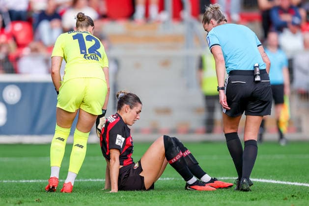 September 14, 2026, Soccer, Women s Bundesliga 1, Bayer 04 Leverkusen vs. FC Bayern Munich, Matchday 4, Ulrich Haberland Stadium, 2026–27 Season Selina Ostermeier of Bayer 04 Leverkusen 02 is injured on the field and requires medical attention; she is injured due to dizziness; injury on the field. DFB regulations prohibit any use of photographs as image sequences and or quasi-video. North Rhine-Westphalia, Germany