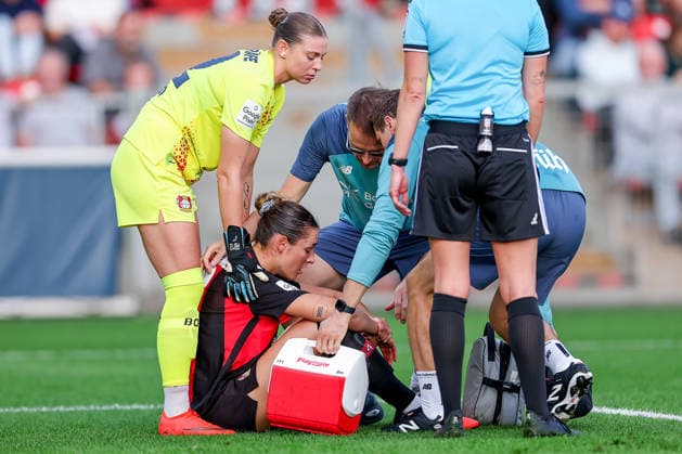 September 14, 2026, Soccer, Women s Bundesliga 1, Bayer 04 Leverkusen vs. FC Bayern Munich, Matchday 4, Ulrich Haberland Stadium, 2026–27 Season Selina Ostermeier of Bayer 04 Leverkusen 02 is injured on the field and requires medical attention; she is injured due to dizziness; injury on the field. DFB regulations prohibit any use of photographs as image sequences and or quasi-video. North Rhine-Westphalia, Germany