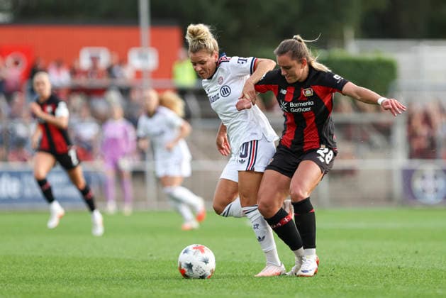Linda Dallmann of FC Bayern Munich and Paulina Tomasiak of Bayer 04 Leverkusen battle for the ball during the Women s Bundesliga match between Bayer 04 Leverkusen and FC Bayern Munich at Ulrich Haberland Stadium on September 14, 2026, in Leverkusen, Germany. Photo by Oliver Kaelke, DeFodi Images. Linda Dallmann of FC Bayern Munich and Paulina Tomasiak of Bayer 04 Leverkusen battle for the ball during the Bundesliga match between Bayer 04 Leverkusen and FC Bayern Munich at Ulrich Haberland Stadium on September 14, 2026 in Leverkusen, Germany. Photo by Oliver Kaelke, DeFodi Images. DFB and DFL regulations prohibit any use of photographs as image sequences and or quasi-video. Photo by Oliver Kaelke, DeFodi Images.