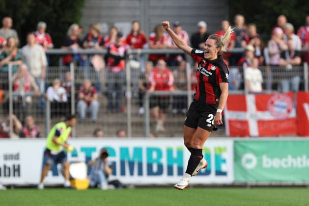Paulina Tomasiak of Bayer 04 Leverkusen celebrates her goal, which made the score 1–0, during the Women s Bundesliga match between Bayer 04 Leverkusen and FC Bayern Munich at Ulrich Haberland Stadium on September 14, 2026, in Leverkusen, Germany. Photo by Oliver Kaelke, DeFodi Images. Paulina Tomasiak of Bayer 04 Leverkusen celebrates after scoring her team’s first goal during the Bundesliga match between Bayer 04 Leverkusen and FC Bayern Munich at Ulrich Haberland Stadium on September 14, 2026 in Leverkusen, Germany Photo by Oliver Kaelke, DeFodi Images DFB and DFL regulations prohibit any use of photographs as image sequences and or quasi-video. Photo by Oliver Kaelke, DeFodi Images