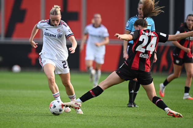 Franziska KETT (M) vs. Lilla TURANYI (LEV) – Action, Tackle, Bayer 04 Leverkusen vs. FC Bayern Munich, Soccer, Google Pixel, Women s Bundesliga, 2026–2027 Season, Matchday 4, on September 14, 2026, at Ulrich Habeland Stadium in Leverkusen, Â
