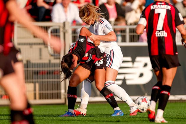 September 14, 2026, Soccer, Women s Bundesliga 1, Bayer 04 Leverkusen vs. FC Bayern Munich, Matchday 4, Ulrich Haberland Stadium, 2026–27 season: Maja Sternad of Bayer 04 Leverkusen (23) in a tackle against Glodis Viggosdottir of FC Bayern Munich. DFB regulations prohibit any use of photographs as image sequences and or quasi-video. North Rhine-Westphalia, Germany