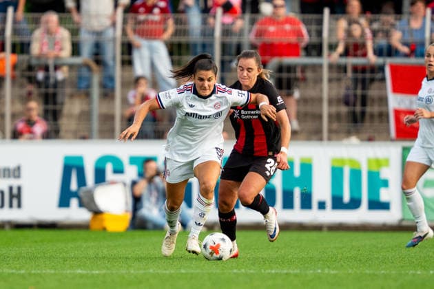 Jovana Damnjanovic, FC Bayern Munich, No. 09, vs. Paulina Tomasiak, Bayer 04 Leverkusen, No. 28; Bayer 04 Leverkusen vs. FC Bayern Munich, Soccer, Google Pixel Women s Bundesliga, Matchday 4, 2026–2027 Season, September 14, 2026 DFB regulations prohibit any use of photographs as image sequences and or quasi-video Bayer 04 Leverkusen vs. FC Bayern Munich, soccer, Google Pixel Women’s Bundesliga, Matchday 4, 2026–2027 Season, September 14, 2026, Leverkusen Copyright: xEibner-Pressefoto J.xDerondeaux EP_JDU