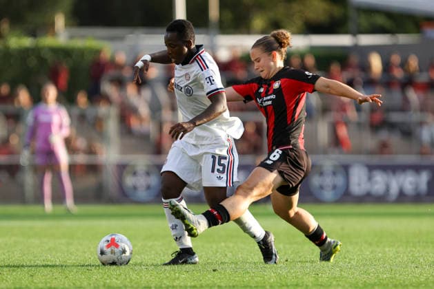 Bernadette Kakounan Amani of FC Bayern Munich and Paulina Platner of Bayer 04 Leverkusen battle for the ball during the Women s Bundesliga match between Bayer 04 Leverkusen and FC Bayern Munich at Ulrich Haberland Stadium on September 14, 2026, in Leverkusen, Germany. Photo by Oliver Kaelke, DeFodi Images. Bernadette Kakounan Amani of FC Bayern Munich and Paulina Platner of Bayer 04 Leverkusen battle for the ball during the Bundesliga match between Bayer 04 Leverkusen and FC Bayern Munich at Ulrich Haberland Stadium on September 14, 2026 in Leverkusen, Germany Photo by Oliver Kaelke, DeFodi Images DFB and DFL regulations prohibit any use of photographs as image sequences and or quasi-video Photo by Oliver Kaelke, DeFodi Images