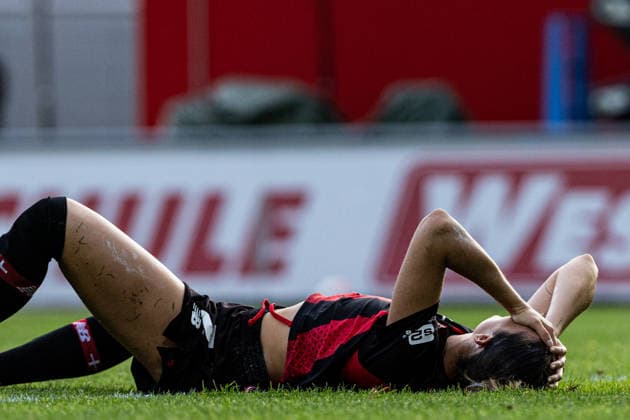 Google Pixel Women s Bundesliga Bayer 04 Leverkusen vs. FC Bayern Munich September 14, 2026 Selina Ostermeier of Bayer 04 Leverkusen, 2 lies on the field after a tackle Women s Bundesliga Google Pixel Women s Bundesliga 26–27 Bayer 04 Leverkusen vs. FC Bayern Munich Ulrich Haberland Stadium, Leverkusen September 14, 2026 DFL regulations prohibit any use of photographs as image sequences and or quasi-video Copyright: xBEAUTIFULxSPORTS Buriakovx