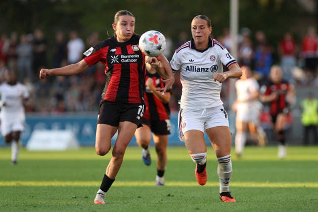 Loreen Bender of Bayer 04 Leverkusen and Klara Buehl of FC Bayern Munich battle for the ball during the Women s Bundesliga match between Bayer 04 Leverkusen and FC Bayern Munich at Ulrich Haberland Stadium on September 14, 2026, in Leverkusen, Germany. Photo by Oliver Kaelke, DeFodi Images. Loreen Bender of Bayer 04 Leverkusen and Klara Buehl of FC Bayern Munich battle for the ball during the Bundesliga match between Bayer 04 Leverkusen and FC Bayern Munich at Ulrich Haberland Stadium on September 14, 2026 in Leverkusen, Germany Photo by Oliver Kaelke, DeFodi Images DFB and DFL regulations prohibit any use of photographs as image sequences and or quasi-video. Photo by Oliver Kaelke, DeFodi Images