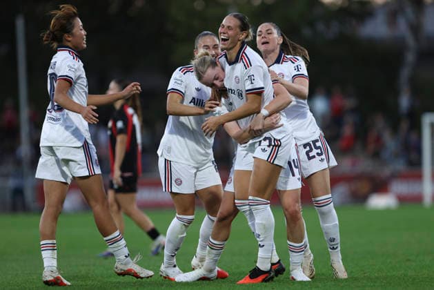 Alara Åžehitler of FC Bayern Munich celebrates a goal with her teammates after scoring the 2-3 goal during the Women s Bundesliga match between Bayer 04 Leverkusen and FC Bayern Munich at Ulrich Haberland Stadium on September 14, 2026, in Leverkusen, Germany. Photo by Oliver Kaelke, DeFodi Images. Alara Åžehitler of FC Bayern Munich celebrates with her teammates after her team scored its third goal during the Bundesliga match between Bayer 04 Leverkusen and FC Bayern Munich at Ulrich Haberland Stadium on September 14, 2026 in Leverkusen, Germany. Photo by Oliver Kaelke, DeFodi Images. DFB and DFL regulations prohibit any use of photographs as image sequences and or quasi-video. Photo by Oliver Kaelke, DeFodi Images.