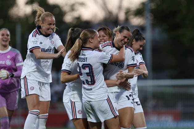 Alara Åžehitler of FC Bayern Munich celebrates a goal with her teammates after scoring the 2-3 goal during the Women s Bundesliga match between Bayer 04 Leverkusen and FC Bayern Munich at Ulrich Haberland Stadium on September 14, 2026, in Leverkusen, Germany. Photo by Oliver Kaelke, DeFodi Images. Alara Åžehitler of FC Bayern Munich celebrates with her teammates after her team scored its third goal during the Bundesliga match between Bayer 04 Leverkusen and FC Bayern Munich at Ulrich Haberland Stadium on September 14, 2026 in Leverkusen, Germany. Photo by Oliver Kaelke, DeFodi Images. DFB and DFL regulations prohibit any use of photographs as image sequences and or quasi-video. Photo by Oliver Kaelke, DeFodi Images.
