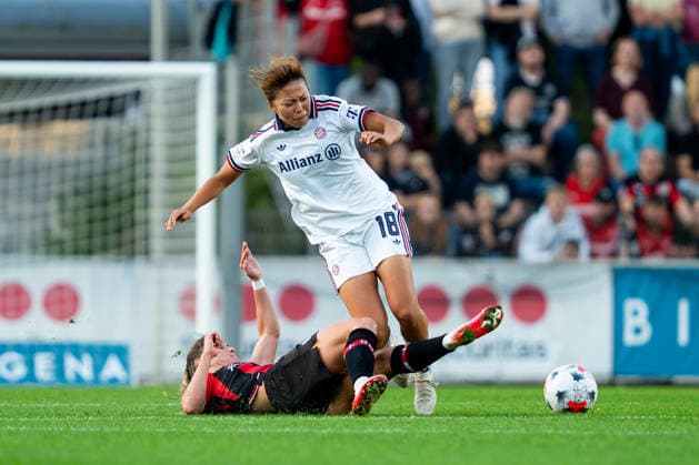 Graetsche by Paulina Tomasiak, Bayer 04 Leverkusen, 28, to Momoko Tanikawa, FC Bayern Munich, 18; Bayer 04 Leverkusen vs. FC Bayern Munich, Soccer, Google Pixel Women s Bundesliga, Matchday 4, 2026–2027 Season, September 14, 2026 DFB regulations prohibit any use of photographs as image sequences and or quasi-video Bayer 04 Leverkusen vs. FC Bayern Munich, soccer, Google Pixel Women’s Bundesliga, Matchday 4, 2026–2027 season, September 14, 2026, Leverkusen Copyright: xEibner-Pressefoto J.xDerondeaux EP_JDU