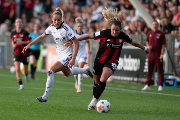 Paulina Tomasiak 28, Bayer 04 Leverkusen Women, in a tackle, in action, with Giulia Gwinn 7, FC Bayern Munich Women; Bayer 04 Leverkusen Women vs. FC Bayern Munich Women, soccer, Google Pixel Women s Bundesliga, Matchday 4, 2026–2027, September 14, 2026. DFB regulations prohibit any use of photographs as image sequences and or quasi-video. Leverkusen, North Rhine-Westphalia, Germany Copyright: xkolbert-press MarkusxVerwimpx