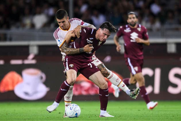 Torino FC v AS Roma - Serie A Alessio Cacciamani of Torino FC competes for the ball with Gianluca Mancini of AS Roma during the Serie A football match between Torino FC and AS Roma. Turin Italy Copyright: xNicolòxCampox