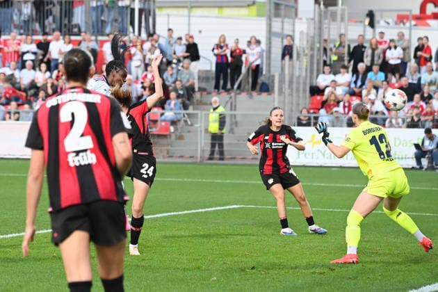 Edna IMADE M scores with a header to make it 2–2 between Bayer 04 Leverkusen and FC Bayern Munich in the 2026–2027 Women’s Bundesliga, Google Pixel, Matchday 4, on September 14, 2026, at the Ulrich Habeland Stadium in Leverkusen, Â