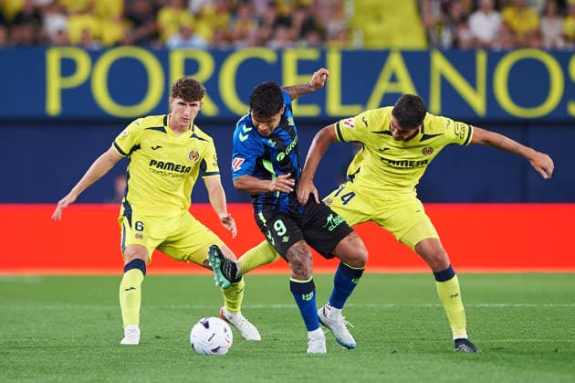 Pau Navarro of Villarreal CF and Cucho Hernandez of Real Betis during the LaLiga EA Sports match between Villarreal CF and Real Betis Balompie at Estadio de la Cerámica on September 14, 2026, in Villarreal, Spain