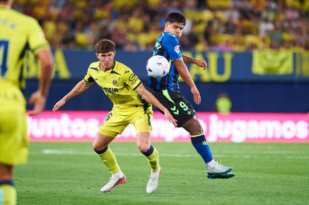 Pau Navarro of Villarreal CF and Cucho Hernandez of Real Betis during the LaLiga EA Sports match between Villarreal CF and Real Betis Balompie at Estadio de la Cerámica on September 14, 2026, in Villarreal, Spain