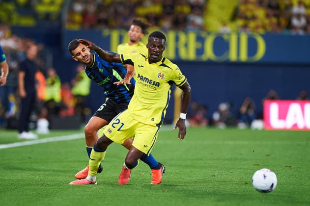 Tani Oluwaseyi of Villarreal CF and Dani Ceballos of Real Betis during the LaLiga EA Sports match between Villarreal CF and Real Betis Balompie at Estadio de la Cerámica on September 14, 2026, in Villarreal, Spain