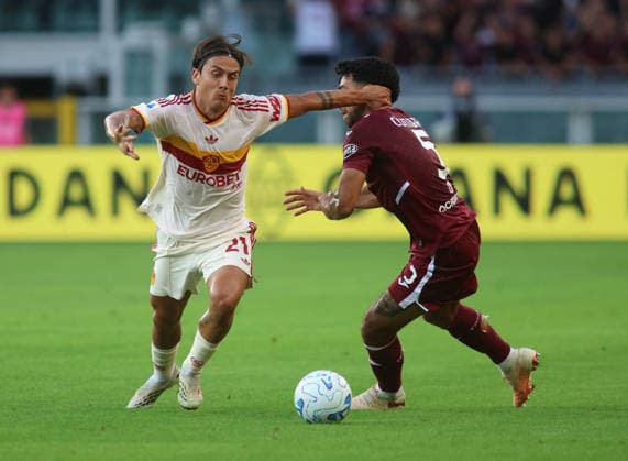 SOCCER - Serie A - Torino FC vs. AS Roma Photo by IPA ABACAPRESS.COM88538900 - Paulo Dybala of AS Roma and Eray Comert of Torino FC during the 2026–27 Italian Serie A season, in a soccer match between Torino FC and AS Roma on September 14, 2026, at the Stadio Olimpico Grande Torino in Turin, Italy. Photo by Nderim KACELI Turin Italy  Copyright: xIPAxSport ABACAx