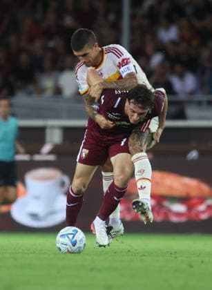 IPA88539606 - Alessio Cacciamani of Torino FC and Gianluca Mancini of AS Roma during the 20026 27 Italian Serie A soccer match between Torino FC and AS Roma on September 14, 2026, at the Stadio Olimpico Grande Torino in Turin, Italy. Photo by Nderim KACELI  Copyright: xNderimxKaceli IPAxSportx xx IPA88539606